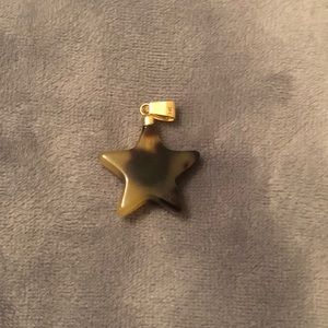 Tortoise star pendant in 18k gold setting